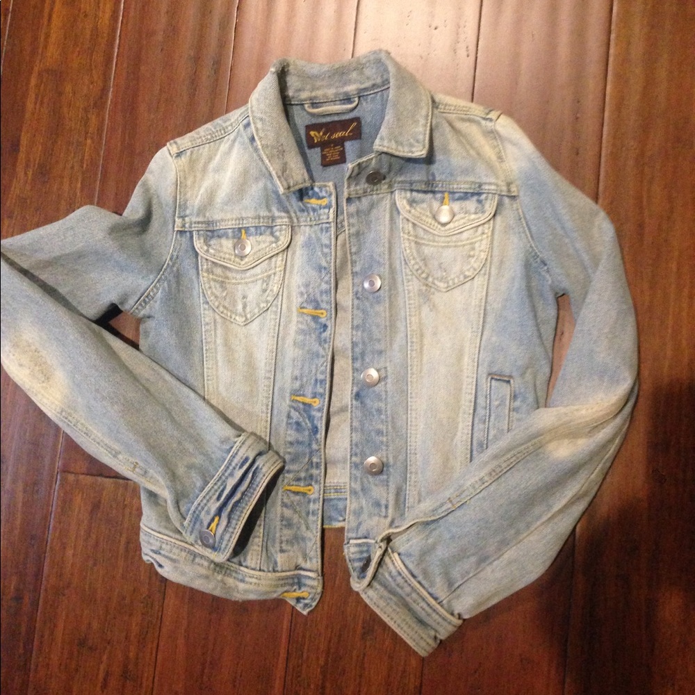 Distressed Denim Jacket.